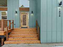 Custom front door with carved relief of the Columbia River